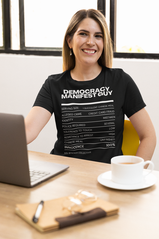 Democracy Manifest Fact Sheet | Black | Unisex Gildan Heavy Cotton Tee